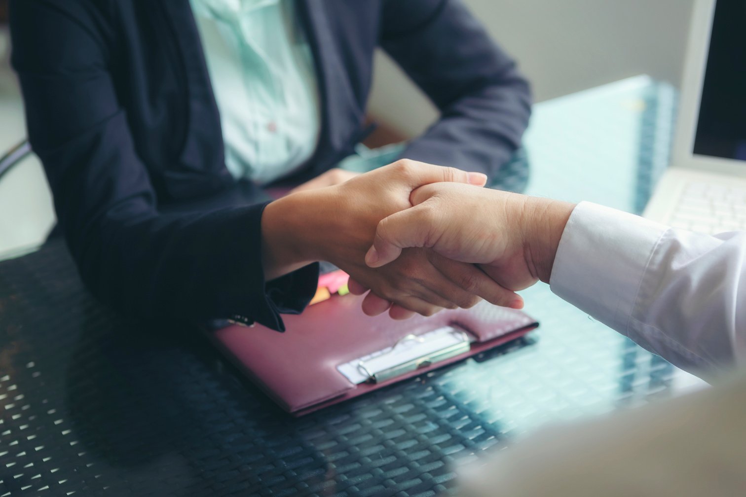 The Image of Two Business People Shaking Hands 